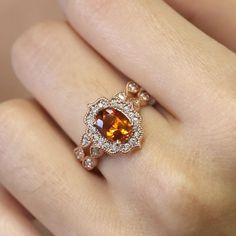 [Citrine Engagement Ring]▷ Citrine : 8x6 Oval shape▷ Diamond TCW: 0.32Ct.▷ Diamond Quality: G / VS2-SI1 ▷ Ring's Material: Solid 14K gold (18K available please contact me)▷ Gold Color : Please choose from white, yellow, rose gold▷ Handmade in the United States▷ Made to order▷ Solid gold & Authentic Natural stones Gold Citrine Engagement Ring, Amber Engagement Ring, Citrine Wedding Ring, Engagement Ring Floral, Citrine Engagement Ring, Art Deco Band, Floral Wedding Ring, Citrine Ring Engagement, Wedding Ring Diamond