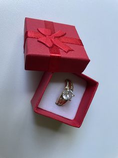 Beautiful classy ring to show off your trendy fashion side or use it as a Gift. This piece is precious and previously owned but it does not have any condition issues, mostly sparkly and beautiful. Costume made and Retro style.Packaging: Complimentary Gift Box as shown Gold Topaz Ring With Vs Clarity For Gift, Gold Topaz Ring With Vs Clarity As Gift, White Bypass Ring With Prong Setting As Gift, White Open Bypass Ring For Gift, White Bypass Ring As Gift, White Open Bypass Ring As Gift, Couple Rings With Vvs Clarity As A Gift, White Ring With Vs Clarity For Gift, Open Ring With Vs Clarity For Gift