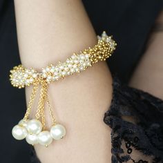 This is an exclusive collection of the finest quality crafted Fashion Jewellery in various colors. This collection of Antique Adjustable Bracelets with gold plating is beautiful, and elegant & will surely galvanize you because this product is unique, comfortable, fashion-forward & very popular for the rich look. The base Metal of our product is Alloy, i.e. Mixing Copper & Brass.MATERIAL - Alloy MetalIDEAL FOR - Gold bangle bracelet, Gold plated bangle, designer kada, Indian Kada, women's bracele Pearl Bracelet Indian, Gold And Pearl Bracelet, Indian Favors, Bracelet Indian, Valentine Anniversary, Gold Plated Bangles, Gold Bangle Bracelet, Gold Bangle, Bracelets For Women