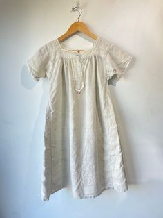 Antique Victorian Dress with initials "M.K." Thick linen. Excellent vintage condition. Fits XS best. Approx. measurements: Arm to arm: 19" Length: 36" Vintage Linen Daywear Dresses, Vintage Linen Dresses For Daywear, Vintage Linen Beach Dress, Vintage Beige Sleep Dress, Vintage Linen Cream Dress, Vintage Cream Linen Dress, Cream Vintage Linen Dress, Cream Short Sleeve Linen Dress, Vintage White Linen Dresses