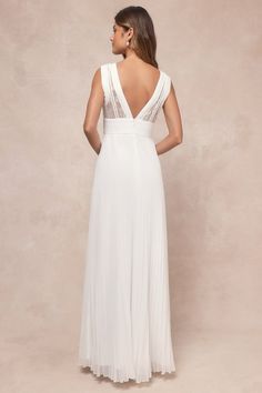 Begin your everlasting love story feeling oh-so-perfect in the Lulus Gorgeous Forever Ivory Chiffon Lace Pleated Backless Maxi Dress! This stunning gown features an airy, woven chiffon composition that shapes a princess-seamed bodice (with a floral lace overlay), a plunging V-neckline with a matching deep V-back, and pleated details at the neckline and cuffs. A pleated, banded waist sits atop an accordion-pleated, A-line skirt that cascades down to an elegant maxi hem. Hidden back zipper/clasp. V-neck Maxi Dress With Pleated Back For Wedding, Wedding Maxi Dress With Sheer Back And Fitted Bodice, Elegant V-neck Wedding Dress For Beach Wedding, Fitted Chiffon Dress With Lace Bodice For Wedding, White Lace Dress With Sheer Back, Elegant White Maxi Dress With Sheer Bodice, Chiffon Wedding Dress With Pleated Fitted Bodice, Fitted Chiffon Wedding Dress With Pleated Bodice, Wedding Chiffon Dress With Pleated Fitted Bodice