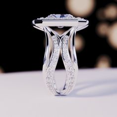 a diamond ring on top of a table