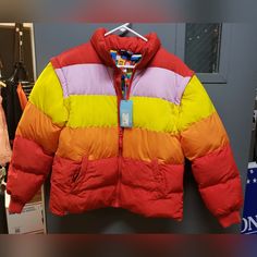 Lego Puffer Jacket, Brand New With Tags. Size Is X-Small. This Could Be For Men Or Women. The Sleeves Unzip So You Can Wear It As A Vest. Super Cute! Multicolor Long Sleeve Puffer Jacket For Spring, Multicolor Spring Puffer Jacket, Multicolor Hooded Puffer Jacket For Fall, Casual Orange Color Block Outerwear, Yellow Spring Puffer Jacket, Multicolor Hooded Puffer Outerwear, Hooded Multicolor Puffer Outerwear, Multicolor Puffer Outerwear For Spring, Casual Multicolor Winter Puffer Jacket