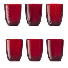 six red glass cups lined up in a row