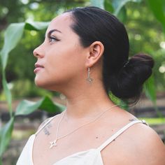 Enchanting all who visit, the desert vibrates with life in a sacred cycle powered by the sun. With the blessing of Zia Pueblo from which this symbol originates, we invite you into the rays of this design that represent the four seasons, directions, stages of life, and quarters of the day. Find yourself empowered as you wear this sterling silver zia necklace, handcrafted by a diverse collective of artisans under the T.Skies roof, in the Land of Enchantment. 18" Sterling Silver Chain 1" Diameter P Zia Symbol, Symbol Earrings, Earrings Display, Handmade Dangle Earrings, Earrings Handmade Dangle, Land Of Enchantment, New Mexican, Sacred Symbols, The Four Seasons