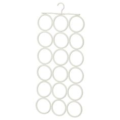 a white hanger with circles hanging from it