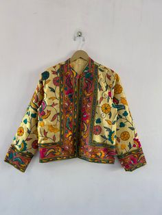 Indian Ethnic Jacket Phulkari Embroidered Vintage stylish designer jacket for women  This is made of cotton fabric with some unique stylish embroidery and printed. A unique combination of colorful embroidery in floral style and bird shape. This jacket is perfect for every traditional functions or parties this gives you a very attractive look. Shop this beautiful outfit for mother's day gift Size : M (40INCH CHEST)  available M, L, XL and we make new jackets according to your measurements in avai Festive Long Sleeve Outerwear With Floral Print, Festive Floral Print Long Sleeve Outerwear, Festive Long Sleeve Floral Print Outerwear, Cotton Nehru Jacket With Printed Motifs For Festivals, Traditional Long Sleeve Outerwear With Printed Motifs, Traditional Nehru Jacket With Floral Print, Traditional Multicolor Nehru Jacket With Printed Motifs, Spring Cotton Nehru Jacket With Printed Motifs, Traditional Floral Print Nehru Jacket