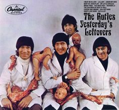 an album cover with the beatles posing for a photo