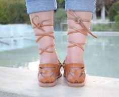 "The SOPHIA, which is Greek for \"wisdom\", is a leather, lace-up, gladiator sandal, with a toe ring detail. Suitable for those who prefer a closed heel, intricate design. Choose to tie at ankle level or knee height for the full gladiator effect. Pair it in matte colours with a pair of summer pants in a fancy print, or tied up high on the leg with your jean shorts and a simple shirt, and let them be the stars of your look. ALL ORDERS ARE SHIPPED VIA TNT EXPRESS WORLDWIDE (Please include a phone Chloe Sandals, Halloween Shoes, Rose Gold Sandals, Fancy Print, Toe Ring Sandals, Let Them Be, Genuine Leather Sandals, Handmade Sandals, Tan Sandals