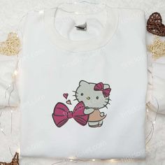 Hello Kitty Bow Embroidered Shirt, Hello Kitty Cartoon Embroiderd Hoodie, Best Gift Ideas For Girls Cute Embroidered Sweatshirt Gift, Cute White Embroidered Hoodie, Cute Cotton Hoodie With Custom Embroidery, Hello Kitty Cotton Sweatshirt In Kawaii Style, Cute Cotton Sweatshirt With Hello Kitty Print, Hello Kitty Embroidery Hoodie, White Crew Neck T-shirt With Hello Kitty Print, Casual Hello Kitty Cotton Sweatshirt, Cute Cotton Sweatshirt With Cat Design