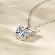 This photo necklace is the best choice to make the memory eternal. It features butterfly designed to open and close. The necklace is created in sterling silver with stunning details, with your own photo included, this beautiful piece will be more memorable. Never miss this romantic and exquisite piece!Carat Weight: 1 ctStone Size: 2*4 mmStone Type: Jeulia® StoneNumber of Stones: 8 Stone Color: Aquamarine BlueStone Shape: MarquiseWeight: 6.1 gWidth: 21.3 mmHeight: 21.4 mmThickness: 5.2 mmMaterial Fine Jewelry Butterfly Pendant Necklace As Gift, Fine Jewelry Butterfly Pendant Necklace, Sterling Silver Necklace With Butterfly Charm, Elegant Sterling Silver Butterfly Necklace For Mother's Day, White Gold Butterfly Necklace With Clavicle Chain For Gifts, Elegant Sterling Silver Butterfly Necklace Gift, Elegant Silver Butterfly Necklace Gift For Her, White Gold Butterfly Necklace For Gift, Silver Butterfly Necklace With Clavicle Chain As Gift