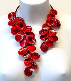 "Ornamental and wonderful Murano  glass necklace made with rigid metal and really beautiful glass red flowers and glass red leaves  made in lampworking techniques. this is very original, special, decorative and different glass necklace  the length is  12,60 inch (32 cm.).            this wonderful glass flowers necklace  is handmade according to the current fashion.  It is a necklace / sculpture suitable for important occasions and social events. ❤  Coupled earrings are also available  ❤  PERFEC Unique Red Flower Jewelry, Unique Red Flower-shaped Jewelry, Unique Red Flower Shaped Jewelry, Red Flower Necklaces For Gifts, Handmade Red Flower Jewelry, Handmade Red Long Necklace, Handmade Long Red Necklace, Handmade Red Flower Necklace, Handmade Red Flower Necklace Adjustable