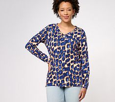 An abstract giraffe print gives this lovely top its personality points. Dress it up or down, depending on the occasion (or your mood!). From Belle by Kim Gravel. Patterned Abstract Print V-neck Top, Chic V-neck Top With Bold Print, Trendy Leopard Print V-neck Top, Spring Stretch Tops With Abstract Print, Spring Leopard Print Relaxed Fit Top, Leopard Print Tops For Spring, Leopard Print Relaxed Fit Top For Spring, Trendy Abstract Print Tops For Fall, Chic Leopard Print Tops For Spring