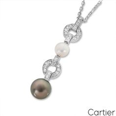 For Sale on 1stDibs - A beautiful 18k white gold pearl and diamond necklace by Cartier from the Himalia collection. The pendant alternates between a diamond set circular motif Elegant Cartier Brilliant Cut Necklace, Cartier White Gold Diamond Necklace, Cartier White Gold Necklace For Weddings, Cartier Platinum Jewelry In White, Cartier White Platinum Jewelry, Elegant Cartier White Gold Necklace, Elegant White Gold Cartier Necklace, Elegant Cartier Diamond Necklace With Brilliant Cut, Cartier Elegant Diamond Wedding Necklace