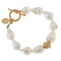 The beauty of baroque pearls is their uniqueness - each pearl varies in size and shape. Approximately 8" inches long Genuine baroque pearls, triple plated 24K gold Toggle clasp Add an extender for extra length Handmade in San Antonio, TX Susan Shaw, Diamond Initial Necklace, Toggle Bracelet, Bijoux Diy, Baroque Pearls, Gold Beads, Pearl Bracelet, Silver Bracelets, Pearl Jewelry