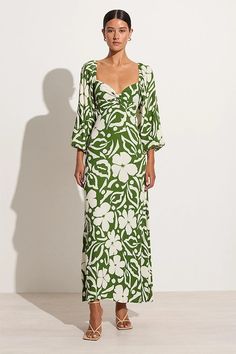 The Ondina Midi Dress in Pavito Floral Olive is designed with a flattering sweetheart neckline, long voluminous sleeves, shirred back panel and a gathered skirt that falls effortlessly to a full length hem. Considerately crafted with rayon crepe fibres from renewable wood sources and hand-printed with large contrast blooms for a statement finish. Perfect for any date night or tropical occasion. Midi Dress With Sleeves Lulus, Elegant Maxi Dress Floral, Formal Floral Dresses With Sleeves, Floral Mother Of The Bride Dresses Casual, Mother Of The Bride Dress For Tropical Wedding, Midi Wrap Dress With Sleeves, Midi Dress With Ruffle Sleeves, Elegant Midi Dresses Casual, Floral Mother Of The Bride Dresses Modern