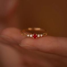 Dainty Ruby Gold Ring, July Birthstone Rings, Ruby Diamond Ring, Red Ruby Stacking Ring, Genuine Ruby Rings, Graduation Ring, Casual Rings We use the highest quality moissanite! Moissanite: ✦ Color: D Colorless ✦ Clarity: VVS1 OR All our diamonds are 100% natural. We use only conflict-free diamonds and gemstones. Diamond: ✦ Color: F-G ✦ Clarity: SI1-VS ✦PRODUCT DETAILS✦ → center stone: natural ruby → accent stone: diamonds Also available in other colored gemstones upon request. Please get in tou Diamond Ruby Ring With Gemstone Accents For Anniversary, Ruby Rings With Accent Stones For Promise, Ruby Rings With Accent Stones And Open Design, Ruby Rings With Accent Stones And Open Ring Shape, Open Ring With Ruby And Accent Stones, Ruby Open Ring With Accent Stones, Ruby Promise Ring With Accent Stones, Red Jewelry With Center Stone In Round Band, Red Jewelry With Center Stone Round Band