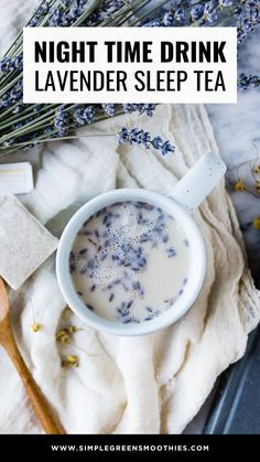 a cup of lavender tea on top of a towel