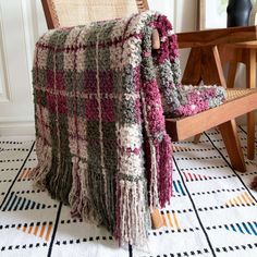 a chair with a blanket on top of it