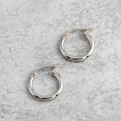 Men's Solid Gold Hoop Earring 14K White Gold Huggie - Etsy Classic Nickel-free Huggie Earrings, Classic Silver Hallmarked Huggie Earrings, Tarnish Resistant White Gold Small Hoop Earrings, Tarnish-resistant Small Hoop Earrings In White Gold, Silver 14k Gold Polished Huggie Earrings, Classic Small Hoop Earrings With Polished Finish, Gift Polished White Gold Hoop Earrings, 14k Gold Silver Huggie Earrings With Polished Finish, White Gold Huggie Earrings With Shiny Finish As Gift