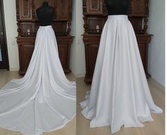 The satin wedding skirt with pockets is made of wedding satin and the skirt also has a lining. The skirt has pockets, but if you want a skirt without pockets, please write to me. Standard skirt length is 45 inches. If you want me to personalize the skirt and make it the size you need, please take measurements of your waist, hips and waist to floor length along with the shoes you will be wearing during the wedding. You can also send a photo of your top and I will try to choose a fabric for the sk Satin Wedding Skirt, Ivory Black Wedding, Wedding Skirts, Bridal Skirt, Bridal Skirts, Wedding Skirt, Wedding White, Skirt With Pockets, Custom Bridal