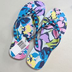 Brand New With Tags Women's Blue, And Multicolor Floral Flip Flops. Vera Bradley, Size 9-10. Listed As Size 9.5 Blue Tropical Sandals For Beach Season, Blue Synthetic Flip Flops For Spring, Blue Flip Flops For Spring Vacation, Blue Flip Flops For Beach In Spring, Blue Tropical Style Flip Flops For Vacation, Spring Vacation Blue Flip Flops, Blue Floral Print Sandals For Summer, Blue Tropical Sandals For Summer, Tropical Blue Sandals For Summer