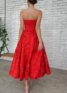 Crimson Ball Gown | Teuta Matoshi Prom Tea-length Dress With Boned Bodice, Prom Dress With Boned Bodice, Tea Length, Tea Length Prom Dress With Boned Bodice, Elegant Red Dress With Lined Bodice, Red Wedding Gown With Boned Bodice, Festive Midi-length Prom Dress, Red Pleated Bodice Evening Dress, Brocade Banquet Dress, Formal Festive Jacquard Dress