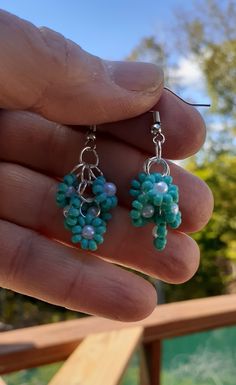 Beaded Flower Earrings in Turquoise Hand beaded flowers connected to create this fun pair of earrings. They are approximately 1 3/4 inches. Beaded Flower Earrings, Hand Beading, Beaded Flowers, Flower Earrings, Art Class, Jewelry Earrings Dangle, Beaded Jewelry, Dangle Drop Earrings, Dangle Earrings