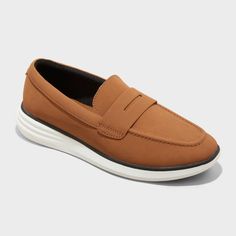 Get dressed for a day in the office and a night out with these Kobi Hybrid Loafer Sneakers from Goodfellow & Co™. These hybrid loafer sneakers showcase a cognac-color polyurethane upper and white TPR outsole. Featuring a pull-on design for easy on and off, these medium-width sneakers include a cushioned footbed and memory foam insole for extra comfortable wear. Goodfellow & Co™: Feel good in what you wear, anywhere. Casual Brown Slip-ons With Brogue Detailing, Casual Wingtip Slip-ons For Business, Modern Brown Slip-ons For Business Casual, Classic Brown Low-top Slip-ons, Brown Slip-ons With Ortholite Insole For Business Casual, Brown Ortholite Insole Slip-ons For Business Casual, Casual Brown Dress Shoes For Work, Brown Low-top Loafers For Business, Brown Low-top Business Loafers