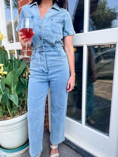 As a denim utility jumpsuit, this garment is designed for functionality with its practical pockets and button-up design. Made from high-quality denim, it offers both comfort and style. Perfect for a casual day out, this fun and versatile jumpsuit is a must-have. Kelly is in size SMALL --Height- 5’4 -Tops- SMALL -Dresses- Small -Jeans- 26/2 Denim Utility Jumpsuit, Utility Jumpsuit, Small Dresses, Tiered Maxi Dress, Small Dress, Maxi Dress Blue, Sweater Blouse, Dress Romper, V Neck Dress