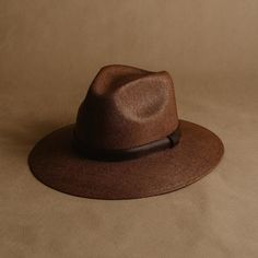 "The Sandoval Puebla hat is a stylish and elegant hat that is perfect for any occasion. It features a stiff brim that helps to keep its shape, and an internal band for a better fit. The paper straw construction is both durable and lightweight, making it ideal for all seasons. The brown color is timeless and will complement any outfit. * Handmade in México * Made from natural materials * 5-star rated model * Etsy's pick: selected by Etsy's style and trend editors SIZES Medium (M) = head circumference of 56 - 58.5cm Large (L) = head circumference of 58.5 - 60cm HOW DO I KNOW MY SIZE Discover your size with a measurement tape. Position the tape above your ears and exactly around your head where you want to wear the hat's brim. DIMENSIONS Brim: 8cm / 3.15\" inch Crown: 11cm / 4.33\" inch ONE-S Brown Curved Brim Fedora For Kentucky Derby, Elegant Brown Fedora For Kentucky Derby, Brown Wide Brim Cloche Hat, Brown Flat Brim Hat For Kentucky Derby, Brown Short Brim Hat For Kentucky Derby, Brown Brimmed Straw Hat, Brown Fedora With Short Brim, Chic Brown Hats For Kentucky Derby, Classic Brown Wide Brim Boater Hat