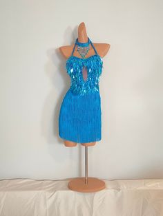 SAMBA FACTORY Lovely handmade Sequin / Beads Dress with beads choker. Open back, tied at the back. ( See pictures ) Perfect as a Samba or Dance competition Dress or for Clubbing an a night out ! This listing is for : TURQUOISE Fringe / Beads Dress, open back. Incl. beads Choker !  ( Please see all pictures ! ) We have many more colors of this gorgeous dresses in stock, please browse in our store ! Dress size : Fits perfect for AU/UK Size 8-10 !  Equivalent to US Size 4-6 ! If you need larger siz Fitted Mini Dress For Carnival, Fitted Sequin Dress For Carnival, Carnival Costume Party Embellished Dress, Embellished Dresses For Carnival Costume Party, Blue Fitted Dress For Festival, Fitted Dress For Costume Party And Festivals, Sleeveless Sequin Dance Dress, Sleeveless Sequin Dress For Dance, Blue Fitted Dress For Fiesta