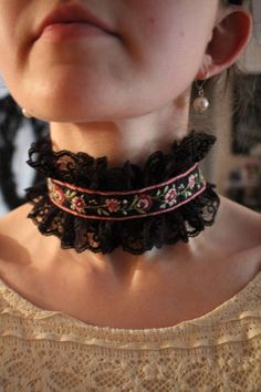 This is a hand sewn choker inspired by the victorian era. There is a ribbon of embroidery on one side and black velvet on the other. It is completely reversible and can have a broach or pin placed to give it a personalized look. Length can be adjusted in the back. Vintage Black Festival Choker, Vintage Black Choker For Festival, Handmade Black Victorian Choker, Velvet Accessories, Victorian Choker, Style Inspiration Edgy, Velvet Choker, The Victorian Era, Gothic Lolita