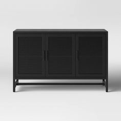 a black cabinet with three doors on one side and an open door on the other