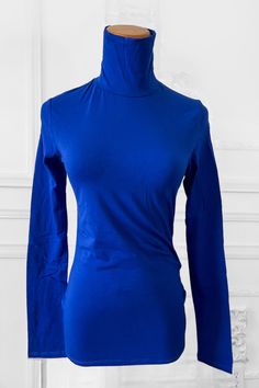 Simple yet a classic turtleneck top that gives you a polish look Fitted Soft Perfect for layering Fits true to size Model is wearing a size small Layering Fits, Classic Turtleneck, Layered Fits, Knitted Swimsuit, Midi Denim, Fitted Turtleneck, Navy Midi Dress, Turtleneck Top, Royal Blue Color