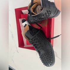 Christian Louboutin Black Leather Brand New Designer Leather Sneakers With Spikes, Black Leather Sneakers With Spikes, Black Sneakers With Red Sole In Calf Leather, Black Calf Leather Sneakers With Red Sole, Luxury Spiked Round Toe Sneakers, Luxury Black Sneakers With Spikes, Trainer Shoes, Leather Trainers, Shoes Color