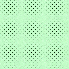 a green background with small black dots