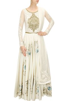 This anarkali is in ivory colour with floral embroidery with contrast blue and navy embroidery on pleats. It has white and gold floral applique work embellished White Anarkali Set With Sheer Dupatta, Designer Cream Floor-length Salwar Kameez, Designer Floor-length Cream Salwar Kameez, Designer Anarkali Gown In Cream, White Floor-length Anarkali Set With Resham Embroidery, Bollywood Style Cream Dress With Sheer Dupatta, White Semi-stitched Anarkali Set For Designer Wear, White Georgette Anarkali Set, Cream Anarkali Gown In Georgette