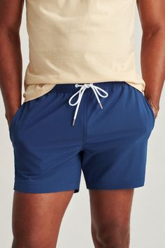 Riviera Recycled Swim Trunks | Bonobos Sports Swimwear With Pockets And 4-way Stretch, Sport Swimwear With Pockets And 4-way Stretch, Nylon Swim Trunks With Pockets For Travel, Sporty Swimwear With Built-in Shorts For Travel, Blue Nylon Bottoms With Functional Pockets, Functional Nylon Swim Trunks With Side Pockets, Sporty Nylon Swim Trunks For Travel, Athleisure Swimwear With Pockets For Sports, Athleisure Sports Swimwear With Pockets