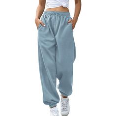 Women High Waisted Sweatpants Joggers Drawstring Athletic Pants With Pockets are the ideal fusion of fashion and coziness. These functional pants are made to move with you, giving you unrestricted freedom to run, jump, and stretch. They are suitable for the entire day because of the smooth, breathable fabric. These jogger pants are a stylish statement that can be dressed up or down thanks to their striking hues and modern style. Specifications: Fabric Type: Cotton, polyester Care Instructions: Baggy Harem Pants With Elastic Waistband, Comfy Joggers With Pockets For Leisure, Baggy Drawstring Sweatpants For Loungewear, Sporty Baggy Bottoms With Drawstring, Baggy Joggers With Side Pockets For Loungewear, Drawstring Joggers For Loungewear, Winter Drawstring Pants For Lounging, Loose Fit Drawstring Sweatpants For Lounging, Drawstring Pants For Winter Lounging