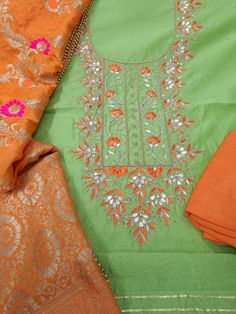 Item Overview ATHARVA Hand Embroidery Salwar Kameez/Chanderi Silk Green/Orange Banarsi Meenakari Dupatta/Gota Patti/Custom Stitch Unstitch/Plazzo/Tunic/Patiala Salwar/Gift Dno. CH2110 Fabric:  * Shirt- Chanderi Silk - Embroidered Neck - 2.5 Mts Beautiful Hand Embroidery * Dupatta: Banarsi Silk Dupatta- Zari Meenakari Dupatta- 2.5 Mts- Latkans Tassels- (Motifs may wary) * Bottom Santoon Silk 2.5 Mts. Excusive Hand Embroidered Party Wear Punjabi Suit. 🌷CUSTOMIZATION (No Extra Charges) * Fabrics C Designer Multicolor Unstitched Suit With Gota Work, Multicolor Semi-stitched Churidar With Gota Work, Traditional Unstitched Art Silk Suit With Gota Work, Traditional Dola Silk Unstitched Suit With Gota Work, Embroidered Katan Silk Sets For Navratri, Traditional Sharara With Handwork And Straight Kurta, Traditional Sharara With Straight Kurta And Handwork, Orange Salwar Kameez With Dabka Work For Eid, Cotton Traditional Wear With Multicolor Embroidery And Dori Work