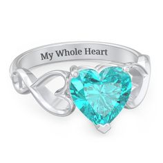 This enchanting ring features a heart shaped solitaire stone of your choice with open heart infinity symbols on the sides. A perfect gift for the hopeless romantic in your life, or even a treat for yourself. 100% customizable with stones, metal, or engraving for a one-of-a-kind ring. Affordable Sterling Silver Heart Ring For Anniversary, Affordable Heart Cut Ring For Anniversary, Heart Solitaire Ring Blue Nile, Cheap Heart-shaped Ring For Anniversary, Cheap Heart Cut Promise Ring, Luxury Heart Shaped Anniversary Birthstone Ring, Silver Heart Jewelry Rainbow Topaz Heart Ring With Celtic Knot, Silver Heart Jewelry Rainbow Topaz Heart Ring With Celtic Knot With Rainbow Topaz Heart Ring With Celtic Knot, Rainbow Topaz Boho Heart Rings Knot