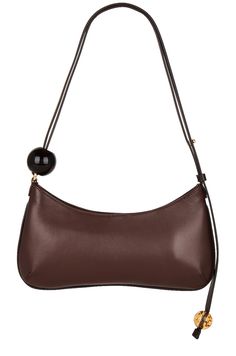 Find JACQUEMUS Le Bisou Perle Bag In Chocolate on Editorialist. JACQUEMUS Le Bisou Perle Bag in Chocolate Leather with twill lining and polished gold-tone hardware. Made in Italy. Zip top closure. One main compartment with single flat pocket. JACQUEMUS logo hardware at front. Adjustable shoulder strap. Measures approx 10.75 W x 6 H x 1 D Shoulder strap with a 8 drop. JQUF-WY289. 23E231BA057-3000. About the designer: At only 19 years of age, Parisian designer Simon Porte Jacquemus birthed his eponymous label to pay homage to his mother. Since then, the brand has been showcasing womenswear with a child-like spirit and a simplistic freedom. JACQUEMUS is confidently experimental yet refined with every asymmetrical, deconstructed, and oversized masterpiece. Luxury Brown Pouch Baguette Bag, Luxury Brown Baguette Bag Pouch, Luxury Brown Crossbody Baguette Bag, Luxury Brown Baguette Bag With Removable Pouch, Modern Brown Shoulder Bag With Gold-tone Hardware, Luxury Brown Baguette Bag With Adjustable Strap, Brown Leather Evening Shoulder Bag, Luxury Brown Hobo Bag For Evening, Formal Brown Shoulder Bag With Detachable Handle