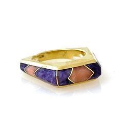 A modern classic by Ben Nighthorse. The Pentagon Ring is inlaid with Charoite and Pink Coral. Set in 18kt yellow gold. Size 9. Special orders available. Luxury Modern Enamel Ring With Gemstone, Luxury Modernist Gemstone Rings, Luxury Yellow Gold Opal Ring With Polished Finish, Luxury Opal Open Ring, Award Winning Jewelry, The Pentagon, Bolo Ties, Pink Coral, Gems Jewelry