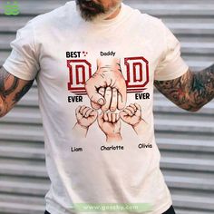 a man wearing a t - shirt that says best dad ever and two hands holding each other