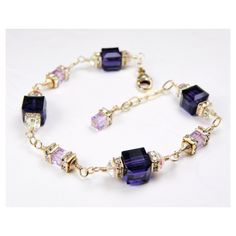 Luscious dark purple Swarovski crystal bracelet is handmade with gorgeous large deep purple Swarovski crystal cubes and small lavender Swarovski crystal cube accents. Bright and clear Swarovski crystal rhinestone crowns add sparkle to this elegant modern bracelet.  A gorgeous bracelet gift for a woman who loves purple hues and sparkly jewelry. Dressy bracelet perfect for weddings: maid of honor, mother of the bride or mother of the groom thank you gifts. Bracelet Details: - Bracelet length is 7 Purple Crystal Beaded Bracelets As Gift, Purple Crystal Bracelet As A Gift, Purple Crystal Bracelets For Gift, Purple Crystal Bracelets As Gift, Elegant Purple Bracelets For Wedding, Elegant Purple Wedding Bracelets, Purple Beaded Bracelets For Wedding, Elegant Faceted Purple Crystal Bracelet, Elegant Purple Faceted Crystal Bracelet