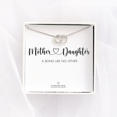 "Celebrate the unbreakable bond between mother and daughter with our timeless Mother & Daughter Bond Necklace. Adorned with delicate rings, each representing the infinite love and connection shared in this special relationship, this necklace is a perfect tribute to the enduring bond that grows and strengthens over time. Crafted with elegance and simplicity, this necklace serves as a daily reminder of the love, support, and shared memories between mother and daughter, making it a cherished accessory for both. Each necklace comes with a heartfelt card reading, \"Mother and Daughter: A Bond Like No Other,\" making it an exquisite gift that expresses the depth of this unique relationship. DETAILS ∙ choose how many rings you want to have on the necklace  ∙ made entirely from 925 sterling silver Adjustable Jewelry For Anniversary And Mother's Day, Adjustable Jewelry For Mother's Day Anniversary, Meaningful Jewelry For Wedding And Mother's Day, Meaningful Rings For Wedding And Mother's Day, Meaningful Wedding Rings For Mother's Day, Meaningful Wedding Jewelry For Mother's Day, Wedding Rings For Mother's Day, Valentine's Day Anniversary Gift Wrapped Jewelry, Silver Rings For Mother's Day Birthday Gift