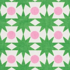 a green and white pattern with pink dots