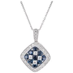 Gregg Ruth vivid blue sapphire and diamond Halo pendant necklace. 18k white gold cushion shape 9 round bright blue sapphires, VS approx. 1.25cts 32 round brilliant cut diamonds, G VS approx. .64cts 18k white gold Stamped: K18 Hallmark: Gregg Ruth 7.0 grams Top to bottom: 25.4mm or 1 Inch Width: 17.5mm or 11/16 Inch Depth or thickness: 6.6mm Chain: 16 Inches Total length: 17 Inches Thickness/depth: 1.3mm Classic Blue Diamond Cut Diamond Necklace, Classic Blue Diamond Necklace With Diamond Cut, Classic Blue Diamond Cut Necklace, Blue Diamond Cut Platinum Necklace, Blue Sapphire Pendant Diamond Necklace, Sapphire Diamond-cut Diamond Necklace, Anniversary Sapphire Pendant Diamond Necklace, Blue Diamond Cut Fine Jewelry Necklace, Sapphire Diamond Necklace With Diamond Cut