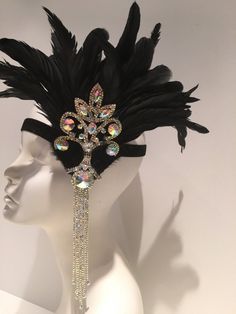 Black Feather Headpiece- Feather 20's Stretch Headdress- Flapper Headband- Black Head Wrap- Handmade in USA- Speakeasy Hello, Stand out in the crowd with this stunning 1920's headpiece. You'll be one of the best dressed at the party! This black feathers are Coque feathers that stand 10 inches high. The clear or ab rhinestone piece measures about 10 inches by 4 inches wide. They are placed on a silver or black sparkle stretch band that fits any head size and very comfortable. Rhinestone Colors: A Adjustable Gatsby Style Headpiece For Carnival, Adjustable Gatsby Headpiece For Costume Party, Gatsby Style Headpiece For Carnival Costume Party, Gatsby Style Fitted Headpiece For Costume Party, Carnival Evening Headband Costume Accessory, Carnival Evening Costume Headband, Fitted Headband For Carnival, Elegant Black Headband For Costume Party, Fitted Gatsby Headpieces For Costume Party